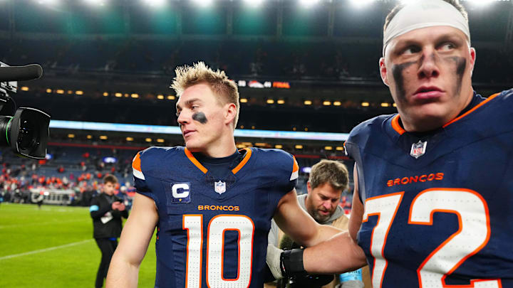 Dec 2, 2024; Denver, Colorado, USA; Denver Broncos quarterback Bo Nix (10) and offensive tackle Garett Bolles (72) following the win against the Cleveland Browns at Empower Field at Mile High. 