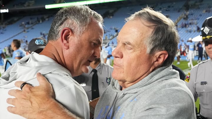 Sep 1, 2025; Chapel Hill, North Carolina, USA; North Carolina Tar Heels head coach Bill Belichick with TCU Horned Frogs head coach Sonny Dykes after the game at Kenan Stadium. Mandatory Credit: Bob Donnan-Imagn Images Sep 1, 2025; Chapel Hill, North Carolina, USA; North Carolina Tar Heels head coach Bill Belichick with TCU Horned Frogs head coach Sonny Dykes after the game at Kenan Stadium. Mandatory Credit: Bob Donnan-Imagn Images