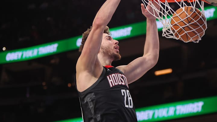 Jan 28, 2025; Atlanta, Georgia, USA; Houston Rockets center Alperen Sengun (28) dunks against the Atlanta Hawks in the fourth quarter at State Farm Arena. Mandatory Credit: Brett Davis-Imagn Images