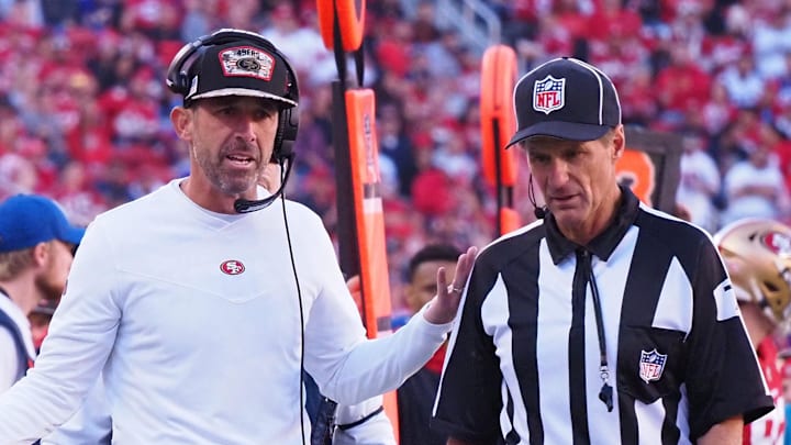 San Francisco 49ers head coach Kyle Shanahan (left)