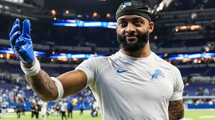 Former Detroit Lions cornerback Carlton Davis III (23) waves at fans after a 24-6 win over the Indianapolis Colts during the second half at Lucas Oil Stadium in Indianapolis, Ind., on Sunday, Nov. 24, 2024.