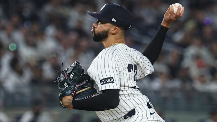 May 2, 2025; Bronx, New York, USA; New York Yankees relief pitcher Devin Williams (38) delivers a pitch during the eighth inning against the Tampa Bay Rays at Yankee Stadium