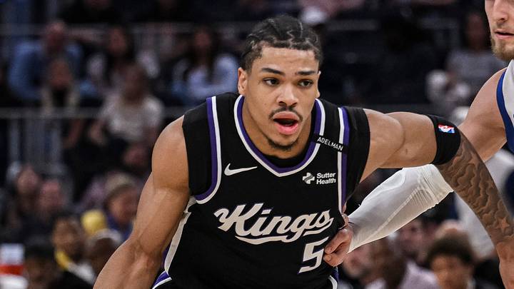 Oct 10, 2026; San Francisco, California, USA;  Sacramento Kings guard Darius Acuff Jr. (5) dribbles against Golden State Warriors guard Brandin Podziemski (2) during the second quarter at Chase Center.  Mandatory Credit: Justine Willard-Imagn Images
