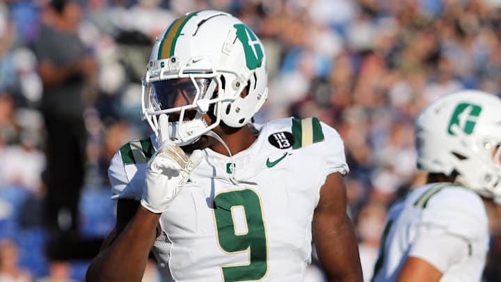 Charlotte 49ers wide receiver O'Mega Blake (9) celebrates after scoring a touchdown during the first half against the Navy Midshipmen at Navy-Marine Corps Memorial Stadium. 