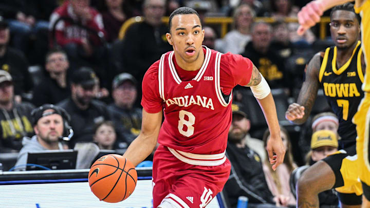 Indiana's Bryson Tucker (8) dribbles against Iowa at Carver-Hawkeye Arena. 