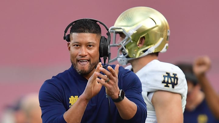 Nov 30, 2024; Los Angeles, California, USA; Notre Dame Fighting Irish head coach Marcus Freeman reacts after cornerback Christian Gray (29) blocks a pass against the Southern California Trojans  during the second half at the Los Angeles Memorial Coliseum.