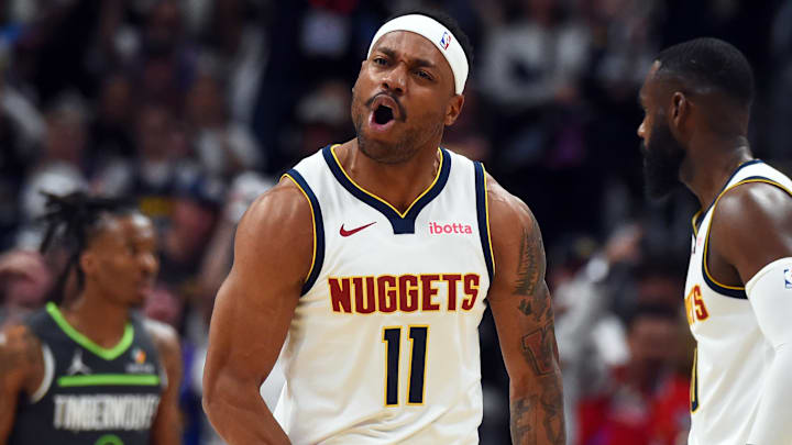 Apr 18, 2026; Denver, Colorado, USA; Denver Nuggets guard Bruce Brown (11) reacts after a basket and foul during the first half against the Minnesota Timberwolves in game one of the first round of the 2026 NBA Playoffs at Ball Arena. Mandatory Credit: Christopher Hanewinckel-Imagn Images
