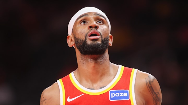 Mar 14, 2026; Atlanta, Georgia, USA; Atlanta Hawks guard Nickeil Alexander-Walker (7) looks to rebound a ball against the Milwaukee Bucks in the first quarter at State Farm Arena. Mandatory Credit: Brett Davis-Imagn Images