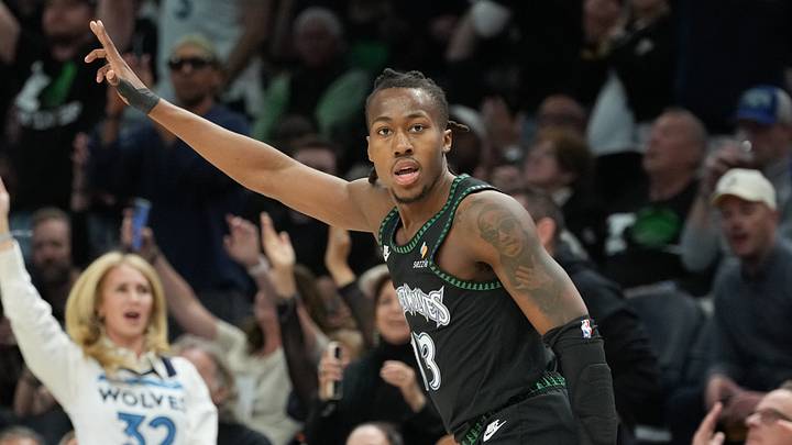 May 8, 2026; Minneapolis, Minnesota, USA; Minnesota Timberwolves guard Ayo Dosunmu (13) celebrates making a three point shot against the San Antonio Spurs in the second half during game three of the second round of the 2026 NBA Playoffs at Target Center. Mandatory Credit: Jesse Johnson-Imagn Images