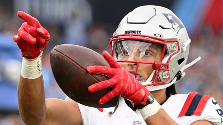 Oct 19, 2025; Nashville, Tennessee, USA; New England Patriots wide receiver Mack Hollins (13) reacts after making a catch against the Tennessee Titans during the first half at Nissan Stadium. Mandatory Credit: Steve Roberts-Imagn Images