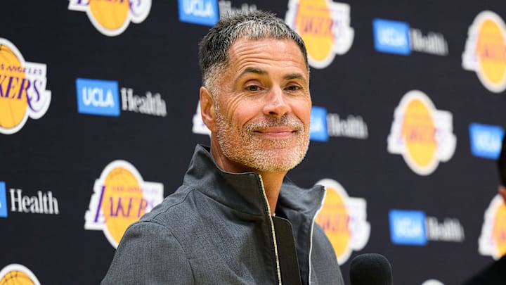 Sep 25, 2025; El Segundo, CA, USA; Los Angeles Lakers general manager Rob Pelinka, left, speaks during a press conference to preview the 2025-26 season at UCLA Health Training Center. Mandatory Credit: William Liang-Imagn Images