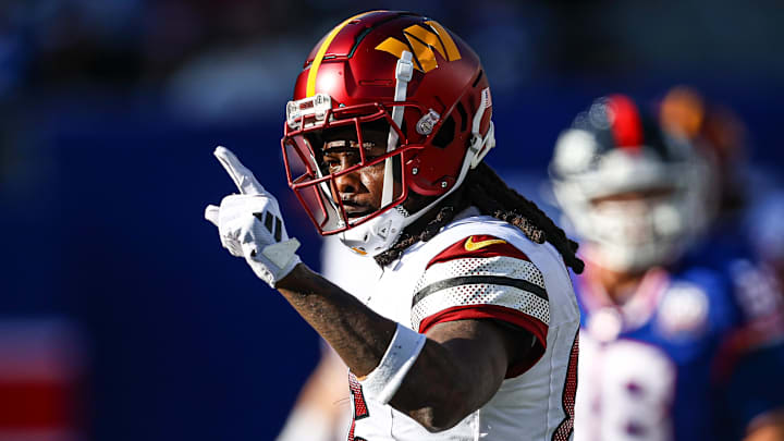 Nov 3, 2024; East Rutherford, New Jersey, USA; Washington Commanders wide receiver Noah Brown (85) reacts after a first down reception during the first half against the New York Giants at MetLife Stadium. Mandatory Credit: Vincent Carchietta-Imagn Images