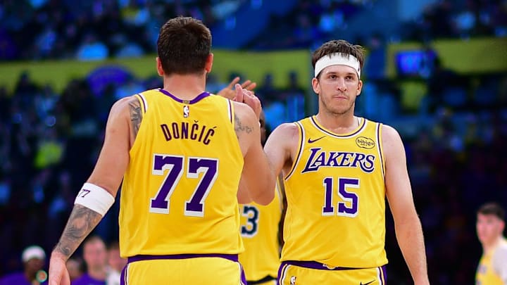 Mar 12, 2026; Los Angeles, California, USA; Los Angeles Lakers guard Luka Doncic (77) and guard Austin Reaves (15) react during the second half at Crypto.com Arena. Mandatory Credit: Gary A. Vasquez-Imagn Images