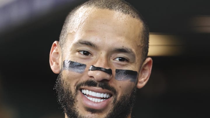 Minnesota Twins shortstop Carlos Correa (4) smiles in the dugout before the third inning against the Houston Astros at Daikin Park on June 14.