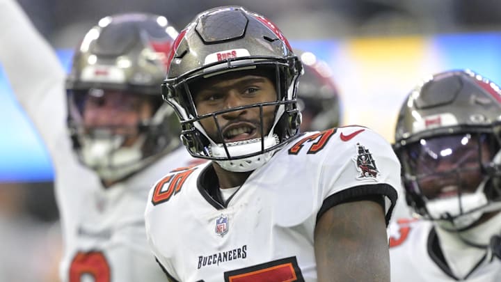 Dec 15, 2024; Inglewood, California, USA; Tampa Bay Buccaneers cornerback Jamel Dean (35) celebrates after a fumble recovery in the second half against the Los Angeles Chargers at SoFi Stadium. Mandatory Credit: Jayne Kamin-Oncea-Imagn Images