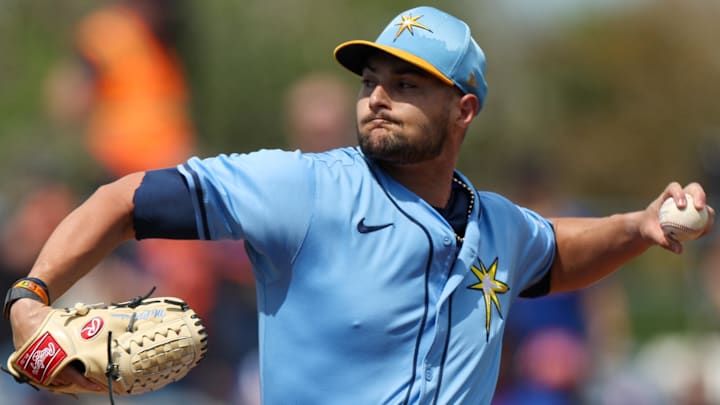 Mar 1, 2025; Port Charlotte, Florida, USA; Tampa Bay Rays pitcher Shane McClanahan (18) throws a pitch against the New York Mets in the first inning during spring training at Charlotte Sports Park.