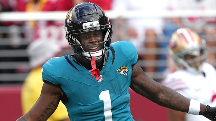 Sep 28, 2025; Santa Clara, California, USA; Jacksonville Jaguars running back Travis Etienne (1) reacts after scoring a touchdown against the San Francisco 49ers during the second quarter at Levi's Stadium. Mandatory Credit: Darren Yamashita-Imagn Images