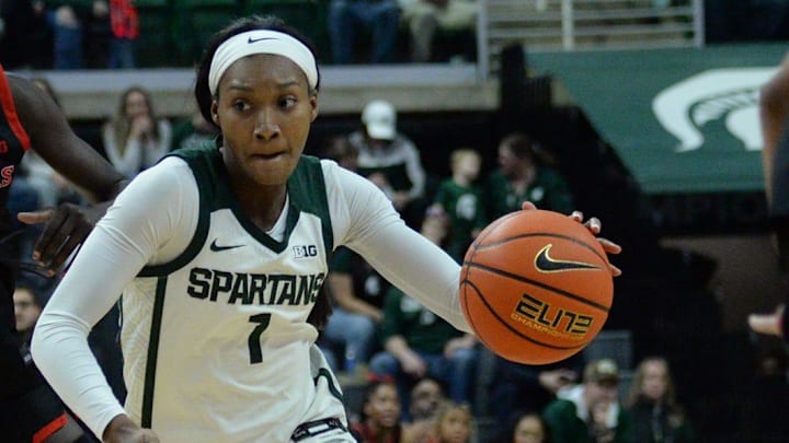 MSU's Rashunda Jones (1) drives to the basket against Rutgers in Big Ten action at the Breslin Center Sunday, Dec. 28, 2025.