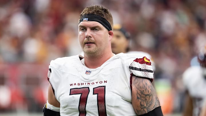 Sep 29, 2024; Glendale, Arizona, USA; Washington Commanders guard Andrew Wylie (71) against the Arizona Cardinals at State Farm Stadium. Mandatory Credit: Mark J. Rebilas-Imagn Images