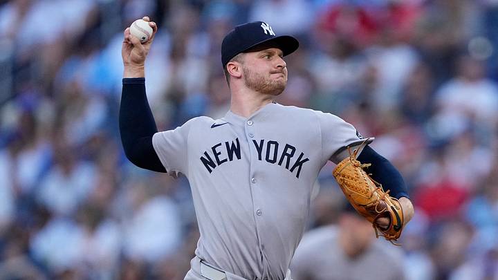 New York Yankees starting pitcher Clarke Schmidt (36) pitches to the Toronto Blue Jays during the second inning at Rogers Centre. Mandatory Credit: John E. Sokolowski-Imagn Images