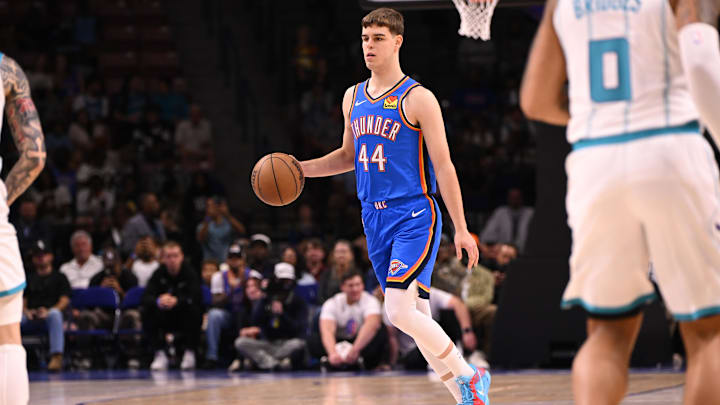 Oct 5, 2025; North Charleston, South Carolina, USA; Oklahoma City Thunder guard Nikola Topic (44) drives up the court against the Charlotte Hornets at North Charleston Coliseum. Mandatory Credit: Arthur Ellis-Imagn Images
