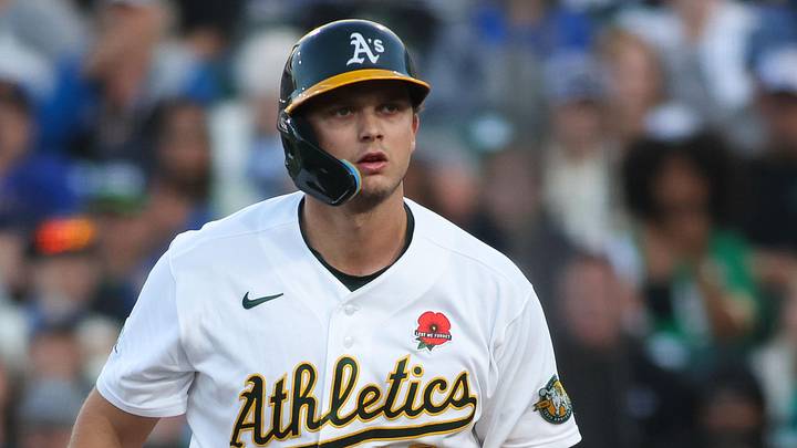 May 25, 2026; West Sacramento, California, USA; Athletics first baseman Nick Kurtz (16) prepares to throw his bat after drawing a walk and extended his on base streak during the third inning against the Seattle Mariners at Sutter Health Park. Mandatory Credit: Scott Marshall-Imagn Images