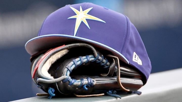 May 14, 2018; Kansas City, MO, USA; A general view of a Tampa Bay Rays hat and glove on the dugout fence before the game against the Kansas City Royals at Kauffman Stadium. May 14, 2018; Kansas City, MO, USA; A general view of a Tampa Bay Rays hat and glove on the dugout fence before the game against the Kansas City Royals at Kauffman Stadium.
