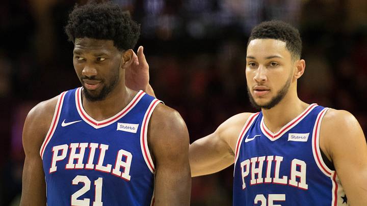 Nov 20, 2017; Philadelphia, PA, USA; Philadelphia 76ers center Joel Embiid (21) walks the floor with guard Ben Simmons (25) after drawing a technical foul against Utah Jazz guard Donovan Mitchell (not pictured) during the fourth quarter at Wells Fargo Center. Mandatory Credit: Bill Streicher-USA TODAY Sports