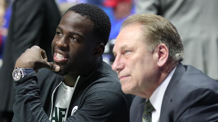 Mar 19, 2017; Tulsa, OK, USA; Golden State Warriors power forward Draymond Green speaks to Michigan State Spartans head coach Tom Izzo before the game between the Kansas Jayhawks and the Michigan State Spartans in the second round of the 2017 NCAA Tournament at BOK Center. Mandatory Credit: Brett Rojo-Imagn Images