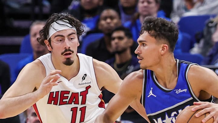 Orlando Magic forward Tristan da Silva drives past Miami Heat forward Jaime Jaquez Jr. Orlando Magic forward Tristan da Silva drives past Miami Heat forward Jaime Jaquez Jr.