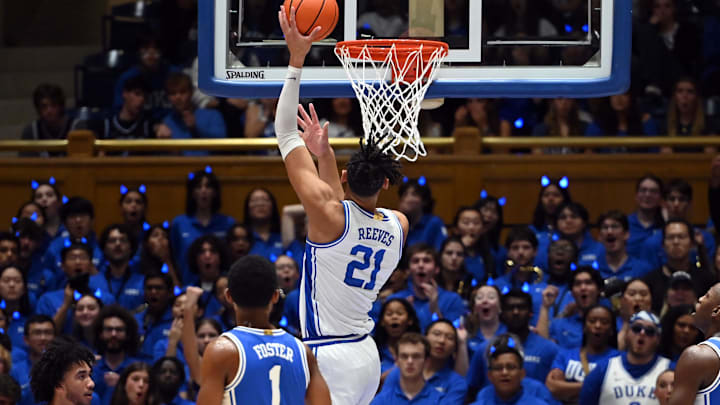 Oct 20, 2023; Durham, NC, USA; Duke Blue Devils center Christian Reeves (21) lays the ball up during Countdown to Craziness at Cameron Indoor Stadium. Mandatory Credit: Rob Kinnan-Imagn Images