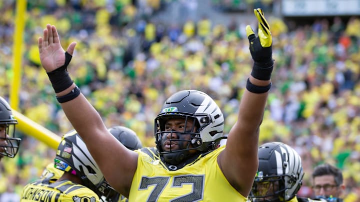 Oregon offensive lineman Iapani Laloulu celebrates a touchdown by Oregon running back Noah Whittington as the No. 1 Oregon Ducks host the No. 21 Illinois Fighting Illini Saturday, Oct. 26, 2024 at Autzen Stadium in Eugene, Ore.
