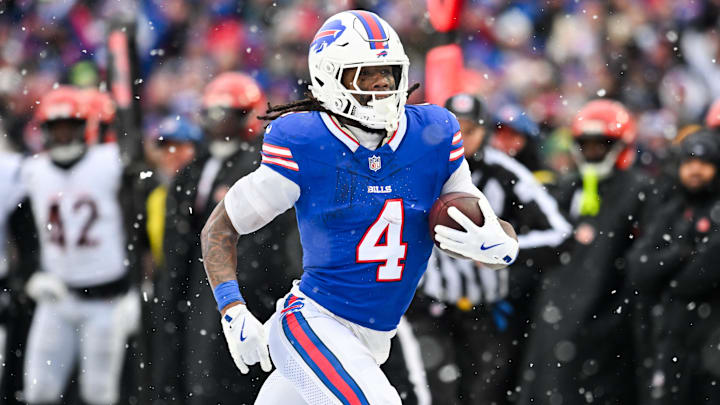 Dec 7, 2025; Orchard Park, New York, USA; Buffalo Bills running back James Cook III (4) runs with the ball in the third quarter against the Cincinnati Bengals at Highmark Stadium. Dec 7, 2025; Orchard Park, New York, USA; Buffalo Bills running back James Cook III (4) runs with the ball in the third quarter against the Cincinnati Bengals at Highmark Stadium.