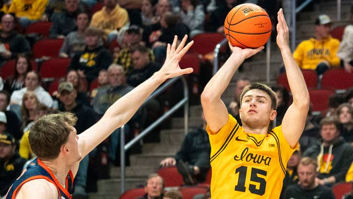 Iowa's Brendan Hausen attempts a basket during a game at Casey's Center on Saturday, Dec. 20, 2025 in Des Moines. Iowa's Brendan Hausen attempts a basket during a game at Casey's Center on Saturday, Dec. 20, 2025 in Des Moines.