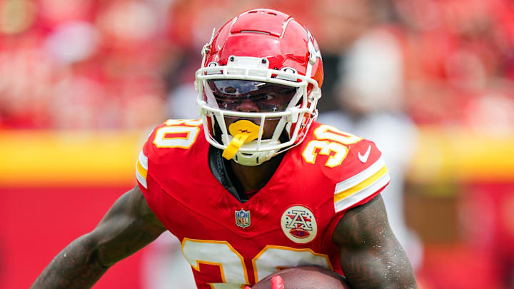 Aug 26, 2023; Kansas City, Missouri, USA; Kansas City Chiefs cornerback Dicaprio Bootle (30) returns an interception during the second half against the Cleveland Browns at GEHA Field at Arrowhead Stadium. Mandatory Credit: Jay Biggerstaff-Imagn Images