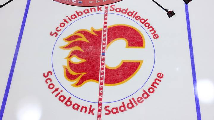 May 18, 2022; Calgary, Alberta, CAN; General view of the Calgary Flames logo on the ice prior to the game between the Calgary Flames and the Edmonton Oilers in game one of the second round of the 2022 Stanley Cup Playoffs at Scotiabank Saddledome. Mandatory Credit: Sergei Belski-Imagn Images May 18, 2022; Calgary, Alberta, CAN; General view of the Calgary Flames logo on the ice prior to the game between the Calgary Flames and the Edmonton Oilers in game one of the second round of the 2022 Stanley Cup Playoffs at Scotiabank Saddledome. Mandatory Credit: Sergei Belski-Imagn Images