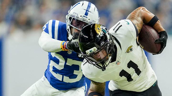 Indianapolis Colts cornerback Kenny Moore II (23) shoves Jacksonville Jaguars wide receiver Parker Washington (11) out of bounds Sunday, Dec. 28, 2025, during a game against the Jacksonville Jaguars at Lucas Oil Stadium in Indianapolis.