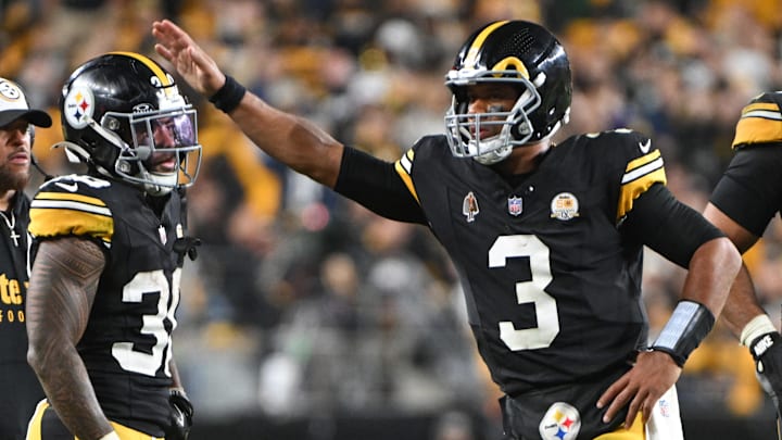 Oct 20, 2024; Pittsburgh, Pennsylvania, USA; Pittsburgh Steelers quarterback Russell Wilson (3) celebrates with running back Jaylen Warren (30) against the New York Jets during the fourth quarter at Acrisure Stadium. Mandatory Credit: Barry Reeger-Imagn Images