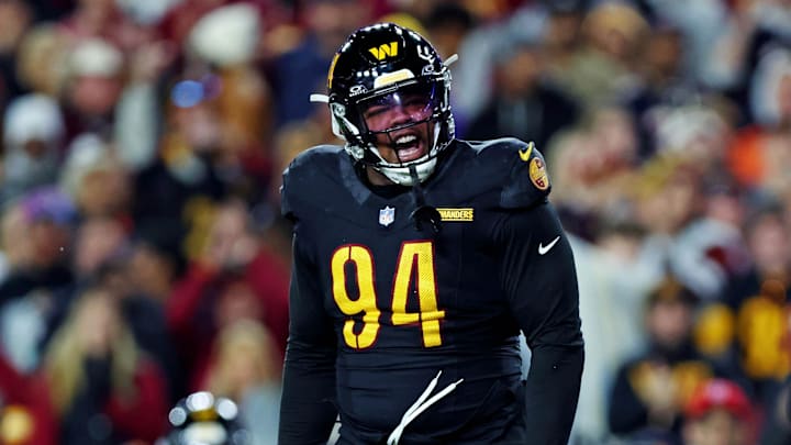 Oct 27, 2024; Landover, Maryland, USA; Washington Commanders defensive tackle Daron Payne (94) celebrates after a fumble recovery during the fourth quarter against the Chicago Bears at Commanders Field. Mandatory Credit: Peter Casey-Imagn Images