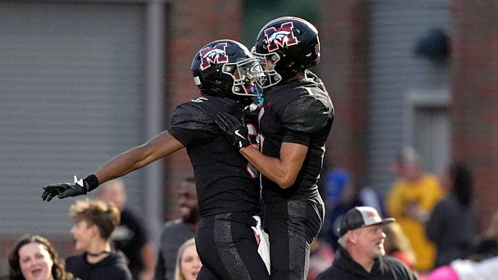 Mustang's Gabriel Osborne, left, celebrates a touchdown with Jaden Johnson during the high school game between Mustang and Yukon at Mustang High School in Mustang, Okla., Friday, Sept. 5, 2025. Mustang's Gabriel Osborne, left, celebrates a touchdown with Jaden Johnson during the high school game between Mustang and Yukon at Mustang High School in Mustang, Okla., Friday, Sept. 5, 2025.