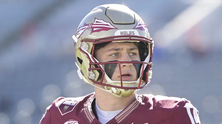 Nov 23, 2024; Tallahassee, Florida, USA; Florida State Seminoles quarterback Luke Kromenhoek (14) warms up before the game against the Charleston Southern Buccaneers at Doak S. Campbell Stadium. Mandatory Credit: Melina Myers-Imagn Images Nov 23, 2024; Tallahassee, Florida, USA; Florida State Seminoles quarterback Luke Kromenhoek (14) warms up before the game against the Charleston Southern Buccaneers at Doak S. Campbell Stadium. Mandatory Credit: Melina Myers-Imagn Images
