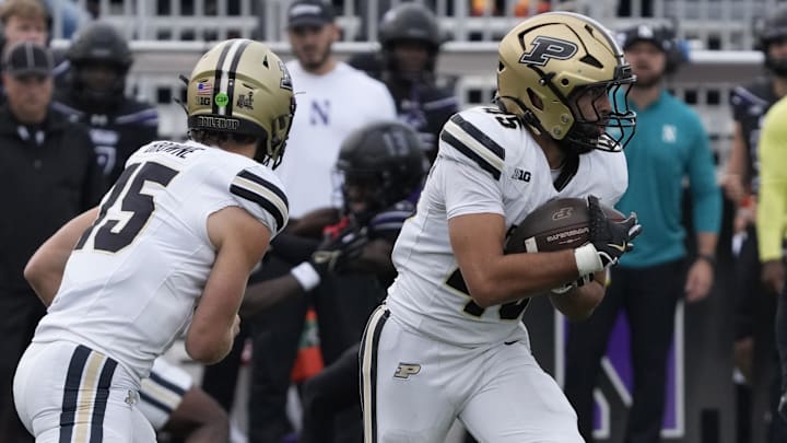 Purdue Boilermakers running back Devin Mockobee (45) runs the ball against the Northwestern Wildcats 