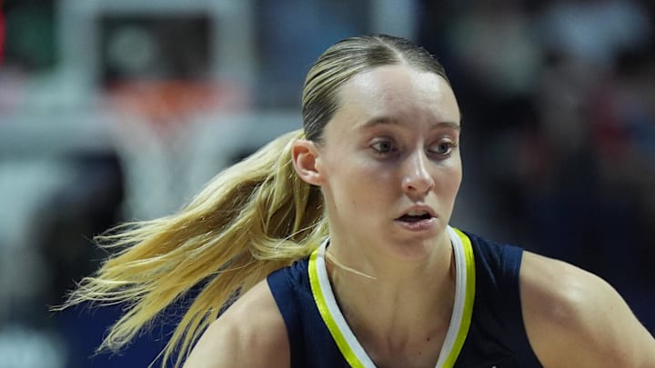 Dallas Wings guard Paige Bueckers drives the ball against Connecticut Sun guard Lindsay Allen