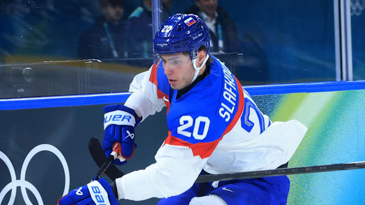 Feb 13, 2026; Milan, Italy; Juraj Slafkovsky of Slovakia in action with Alex Trivellato of Italy during a Group B men's ice hockey game during the Milano Cortina 2026 Olympic Winter Games at Milano Rho Ice Hockey Arena. Mandatory Credit: Katie Stratman-Imagn Images Feb 13, 2026; Milan, Italy; Juraj Slafkovsky of Slovakia in action with Alex Trivellato of Italy during a Group B men's ice hockey game during the Milano Cortina 2026 Olympic Winter Games at Milano Rho Ice Hockey Arena. Mandatory Credit: Katie Stratman-Imagn Images