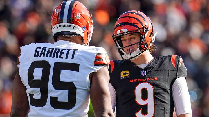 Cincinnati Bengals QB Joe Burrow (9) and former Cleveland Browns defensive end Myles Garrett (95) talk between plays Cincinnati Bengals QB Joe Burrow (9) and former Cleveland Browns defensive end Myles Garrett (95) talk between plays