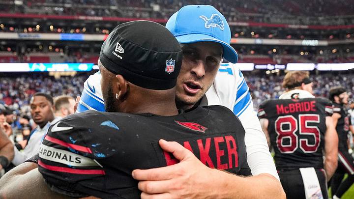 Detroit Lions quarterback Jared Goff (16) hugs Arizona Cardinals safety Budda Baker (3) after 45-21 win Detroit Lions quarterback Jared Goff (16) hugs Arizona Cardinals safety Budda Baker (3) after 45-21 win