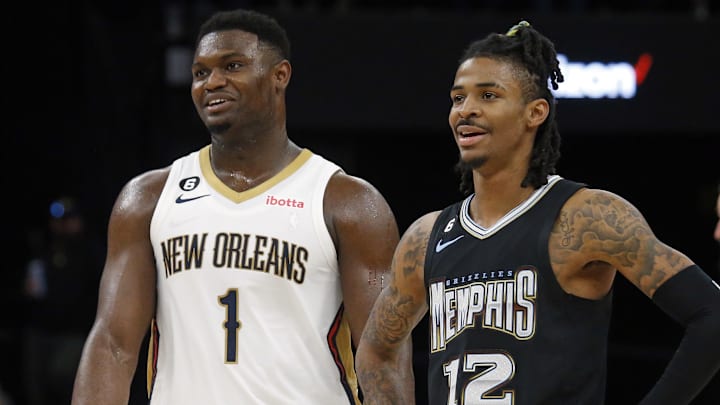 Nov 25, 2022; Memphis, Tennessee, USA; New Orleans Pelicans forward Zion Williamson (1) and Memphis Grizzlies guard Ja Morant (12) talk during free throws during the second half at FedExForum. Mandatory Credit: Petre Thomas-Imagn Images Nov 25, 2022; Memphis, Tennessee, USA; New Orleans Pelicans forward Zion Williamson (1) and Memphis Grizzlies guard Ja Morant (12) talk during free throws during the second half at FedExForum. Mandatory Credit: Petre Thomas-Imagn Images