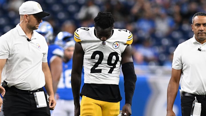 Aug 24, 2024; Detroit, Michigan, USA; Pittsburgh Steelers cornerback Ryan Watts (29) walks off the field after being injured against the Detroit Lions late in the fourth quarter at Ford Field. Mandatory Credit: Lon Horwedel-Imagn Images Aug 24, 2024; Detroit, Michigan, USA; Pittsburgh Steelers cornerback Ryan Watts (29) walks off the field after being injured against the Detroit Lions late in the fourth quarter at Ford Field. Mandatory Credit: Lon Horwedel-Imagn Images