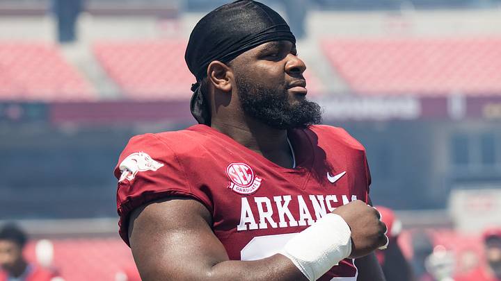 Arkansas Razorbacks defensive lineman David Oke (92) gets ready to play in the  spring game at Razorback Stadium. 