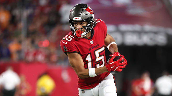 Oct 21, 2024; Tampa, Florida, USA; Tampa Bay Buccaneers wide receiver Jalen McMillan (15) runs with the ball against the Baltimore Ravens during the first quarter at Raymond James Stadium. Mandatory Credit: Kim Klement Neitzel-Imagn Images